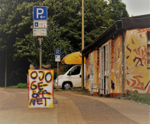 Ojo geöffnet Schild